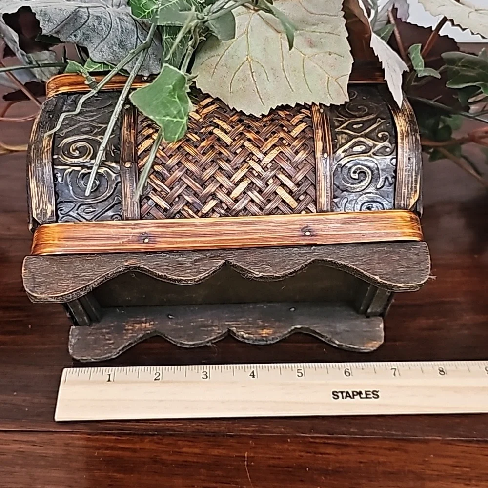 Vintage faux plant in wooden chest box decoration